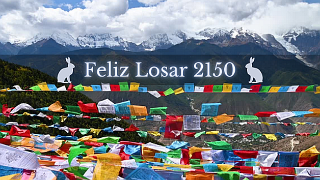 Tibetan new year greeting with a photo of tibetan prayer flags waving in the wind